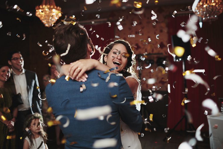 bride and groom first dance with confetti cannon