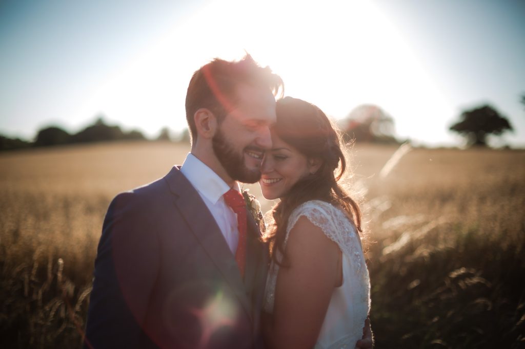 Bride and groom at sunset